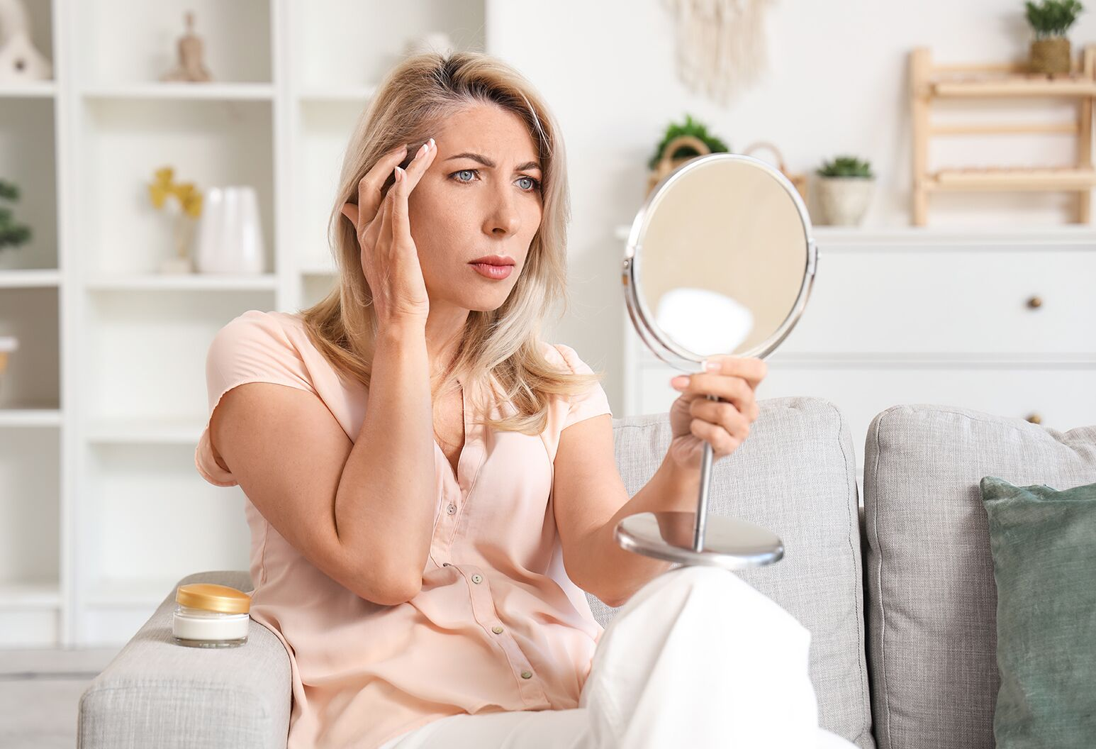 young adult looking older in mirror premature aging skin